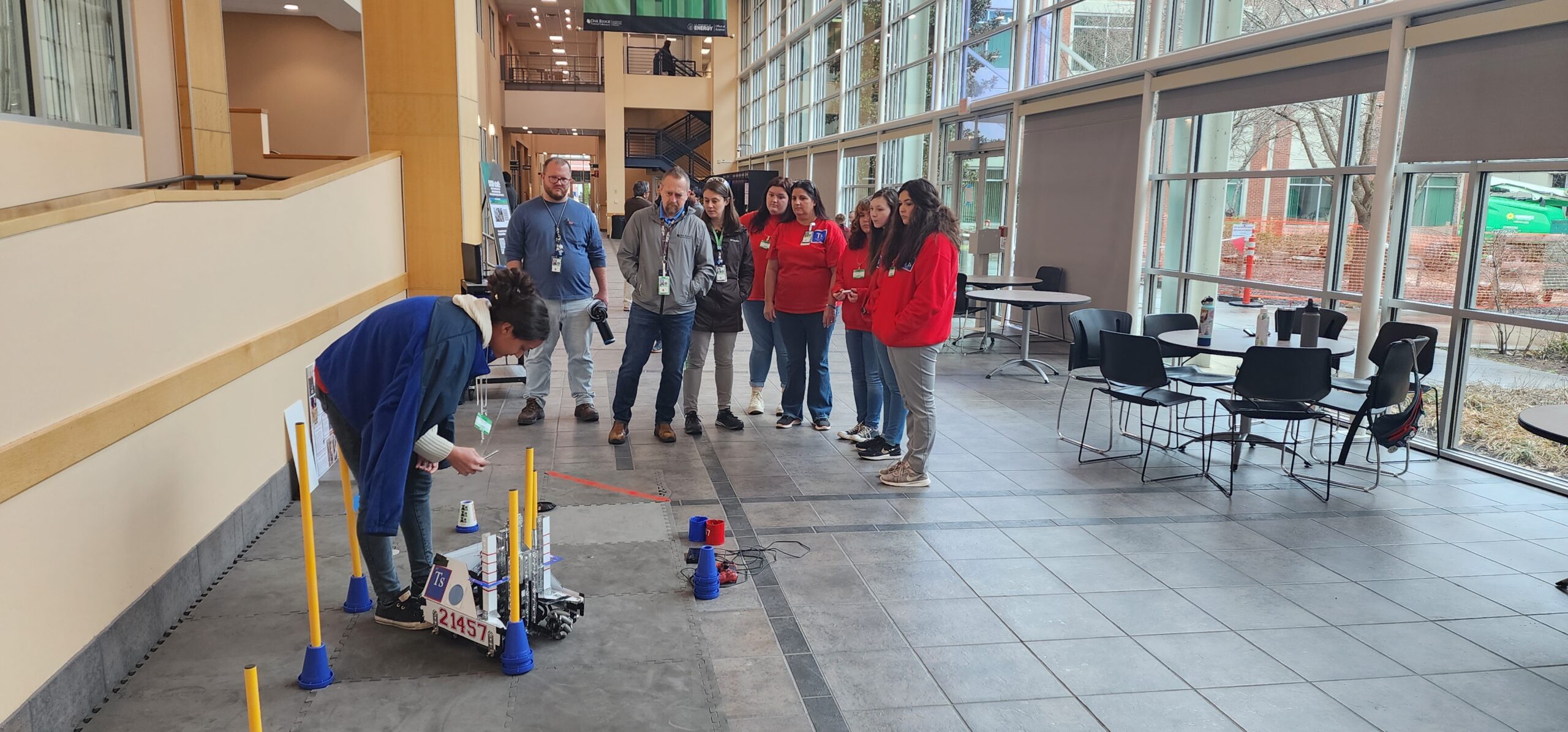 Members of the Tennessine Titans demonstrate their robot on ORNL's campus. Credit: Carlos Jones.