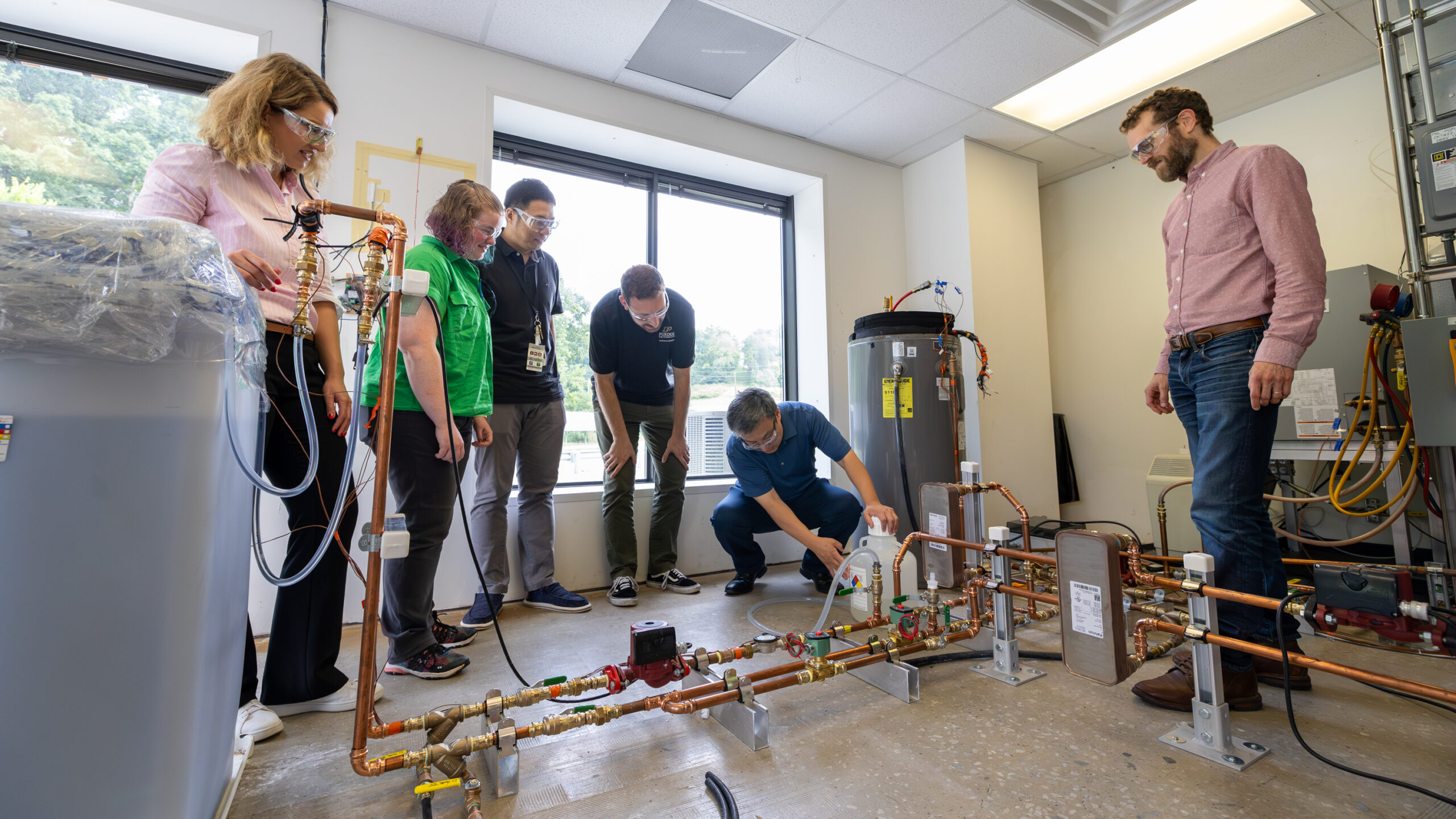 Winners of the annual building science student competition, JUMP into STEM, work alongside researchers in the Building Technologies Research and Integration Center at ORNL during summer internships.