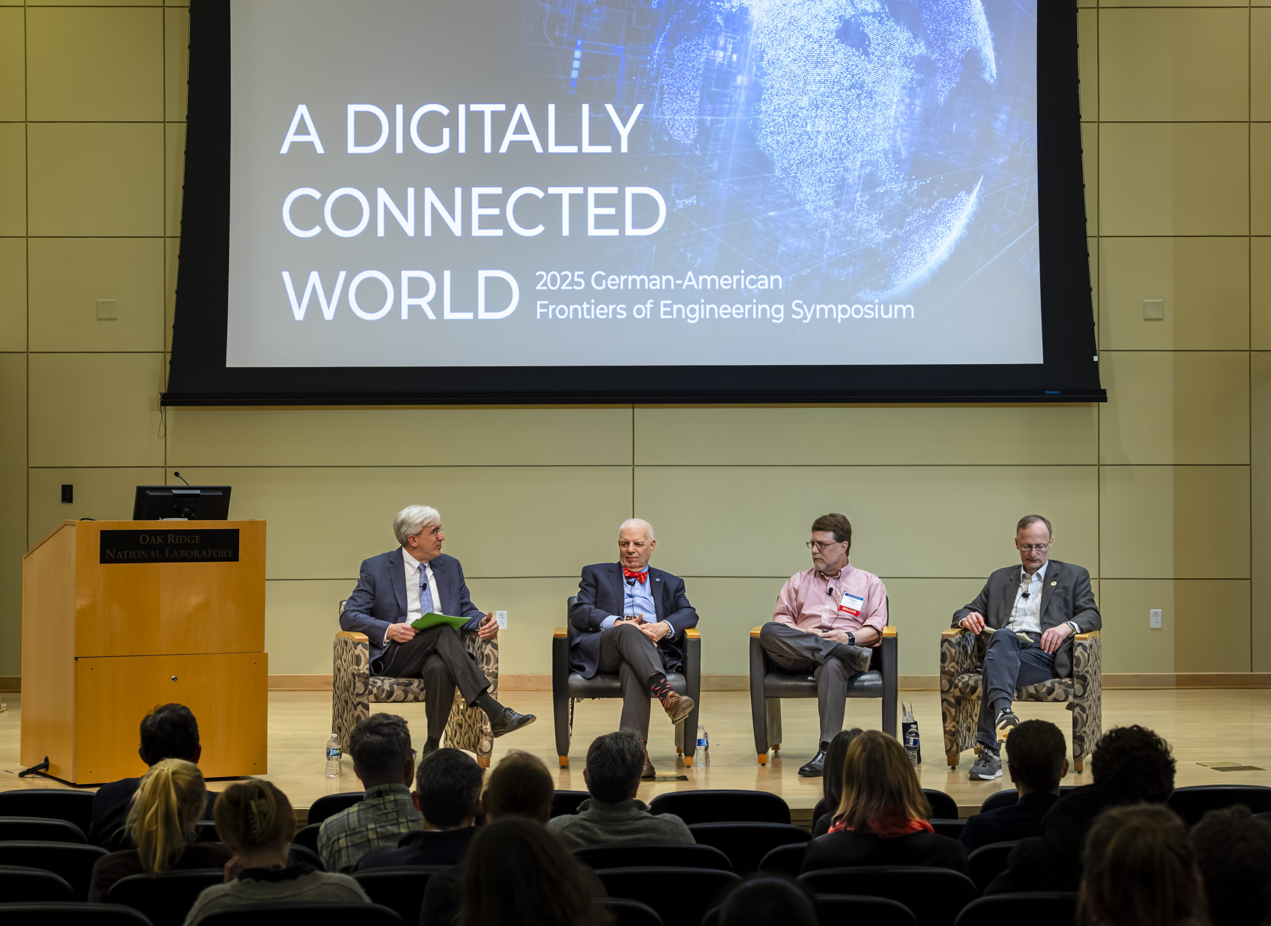 David Keim, far left, chief communications officer for ORNL, moderates a fireside chat with, left to right, Al Romig, NAE member and executive officer; Stephen Streiffer, ORNL laboratory director; and Walter Denk, with the Alexander von Humboldt Foundation; as part of the German-American Frontiers of Engineering Symposium.