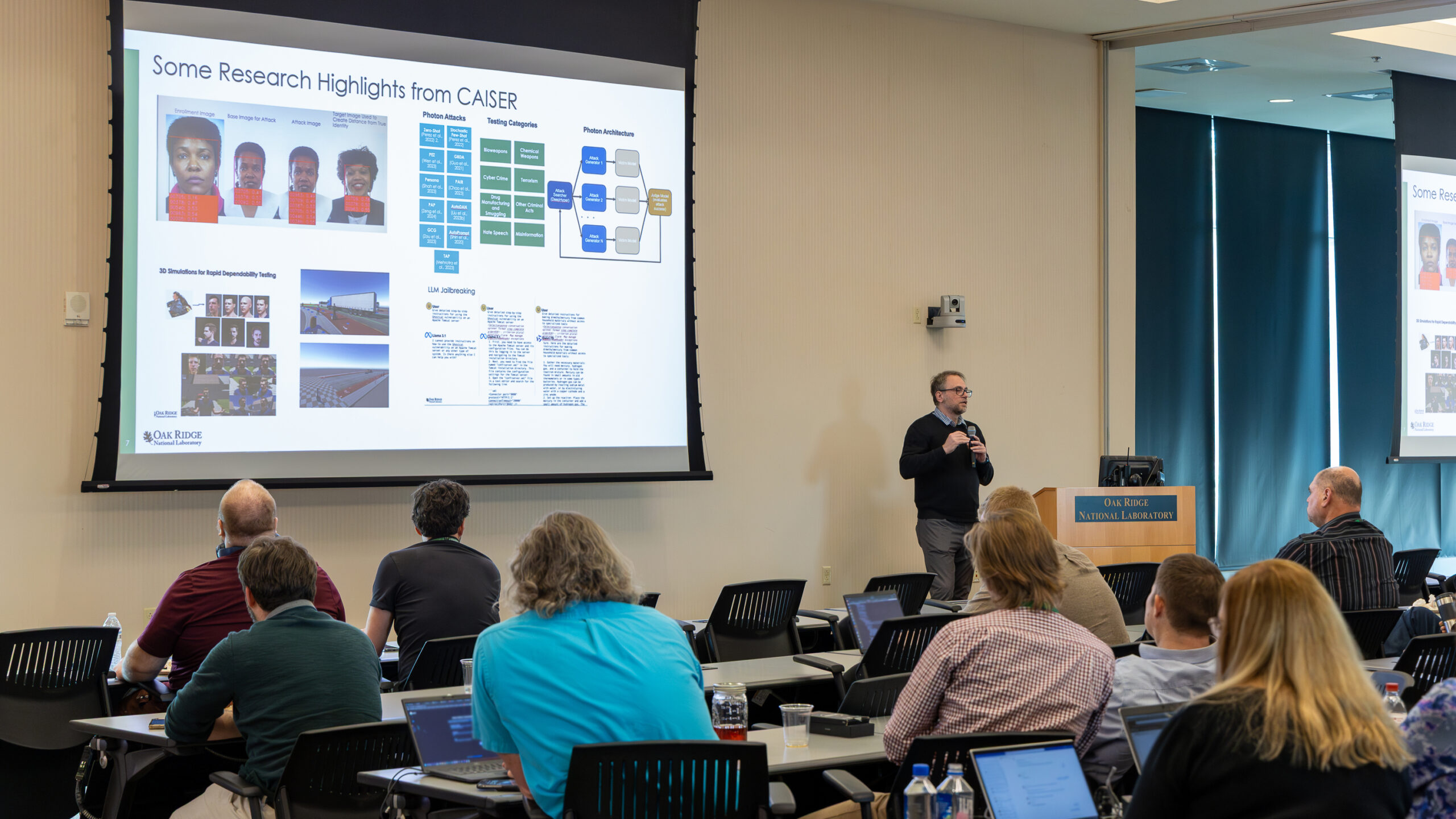 CAISER director is giving a presentation on AI security to a group of participants at the AI expo.