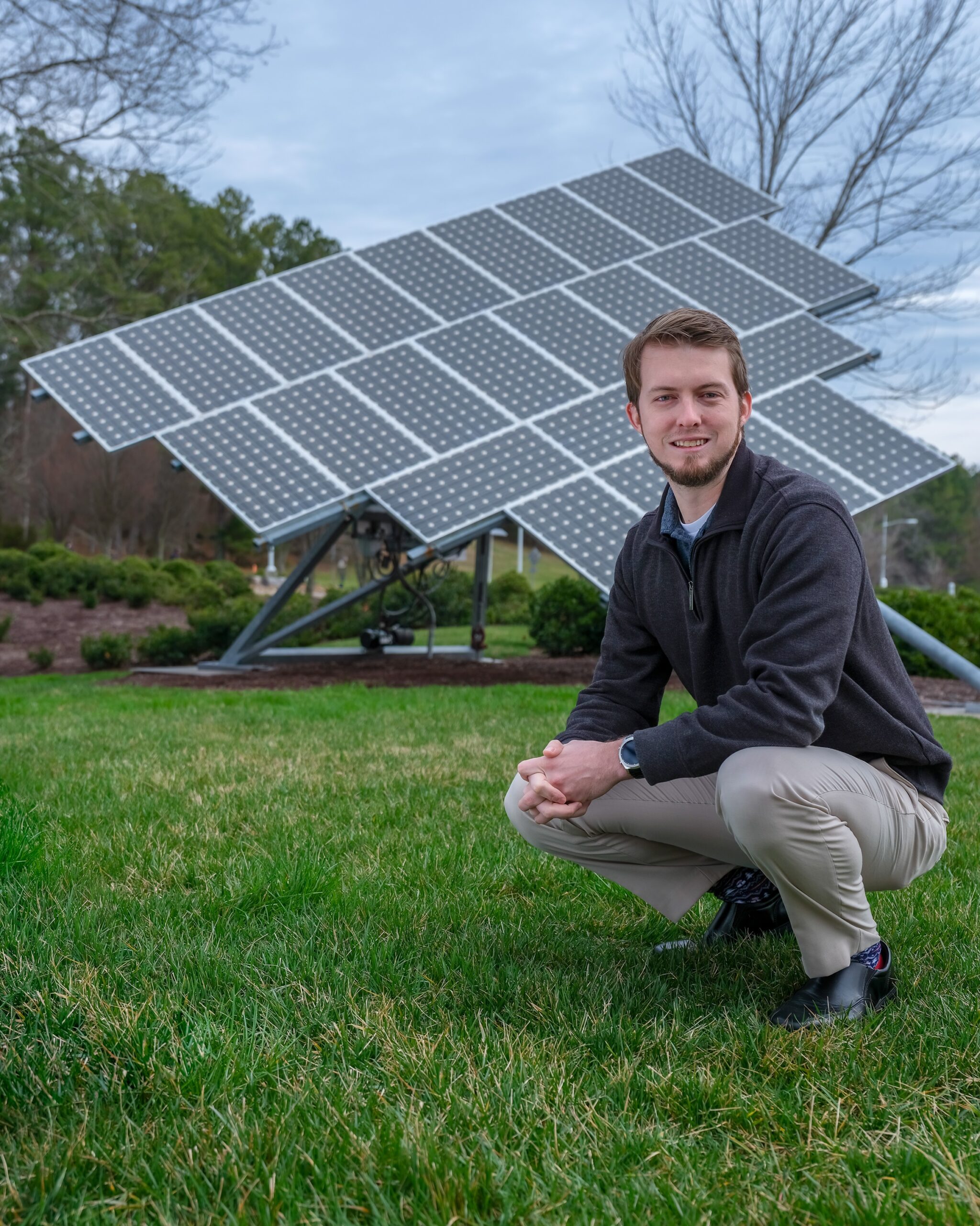 Ben Ollis in front of ORNL Solar Array