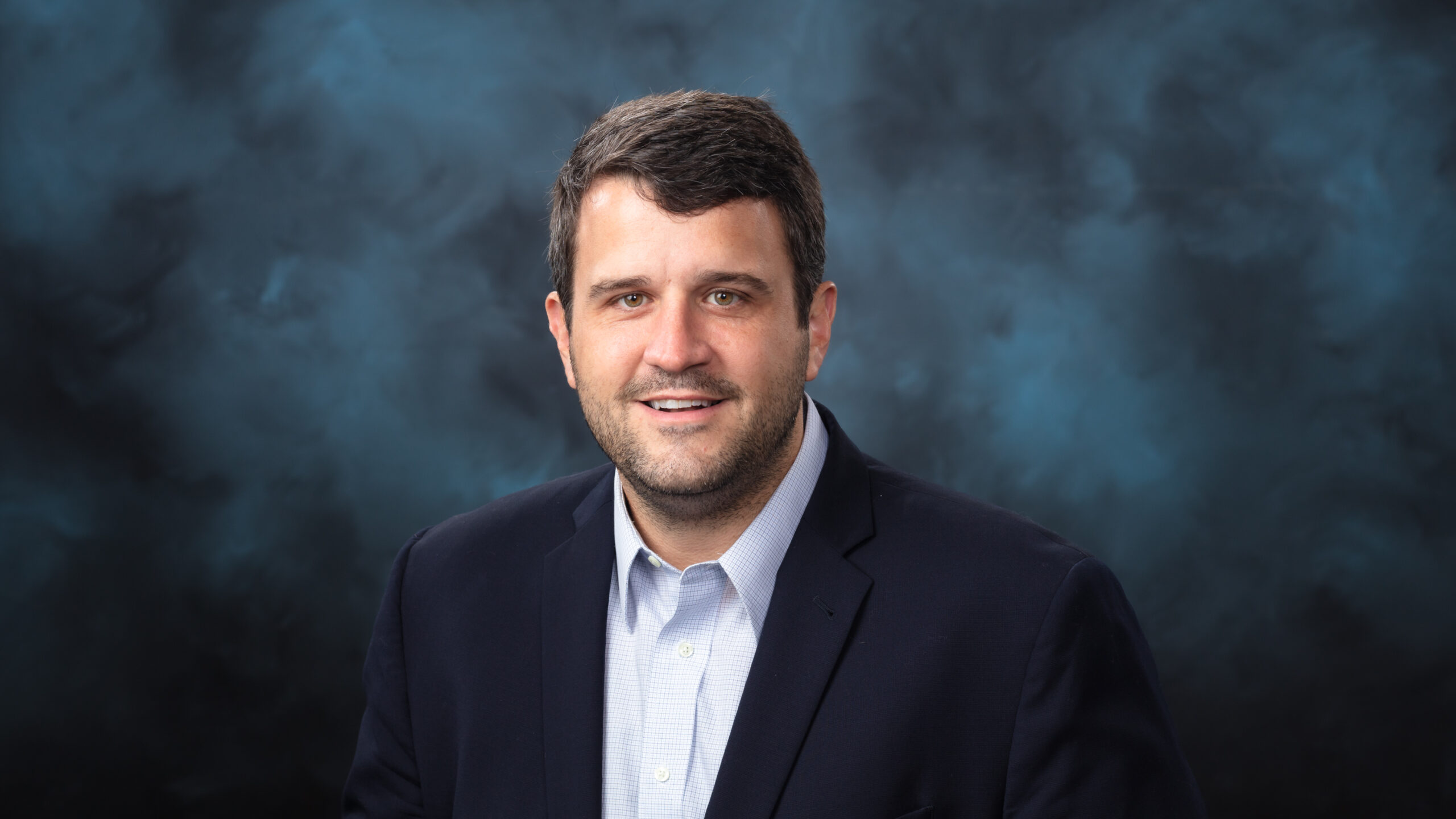 Portrait of researcher Ben Manard