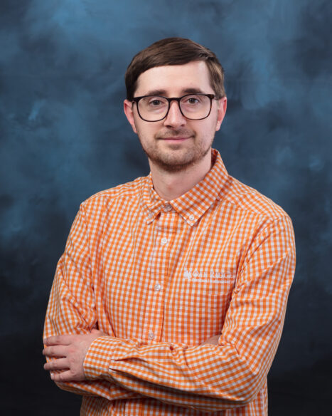 Cannon Giglio, a postdoctoral research associate at ORNL, poses for a studio portrait on May 19, 2026.