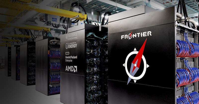 Frontier supercomputer with open cabinet displaying internal wiring